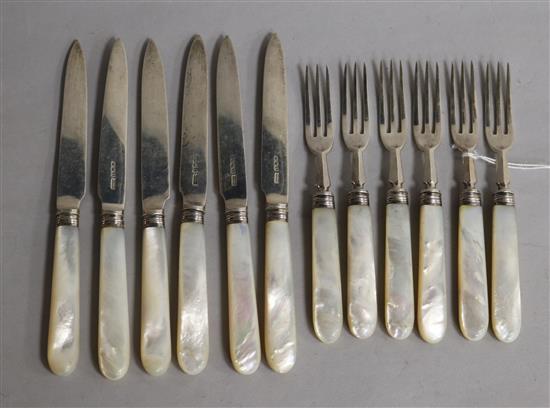 A set of six pairs of George V mother of pearl handled silver dessert eaters, James Dixon & Sons, Sheffield, 1927/8.